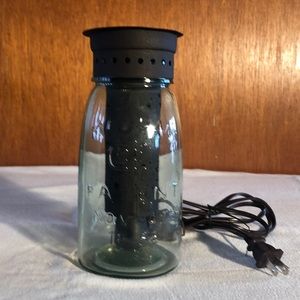 Mason jar night light with star cut outs